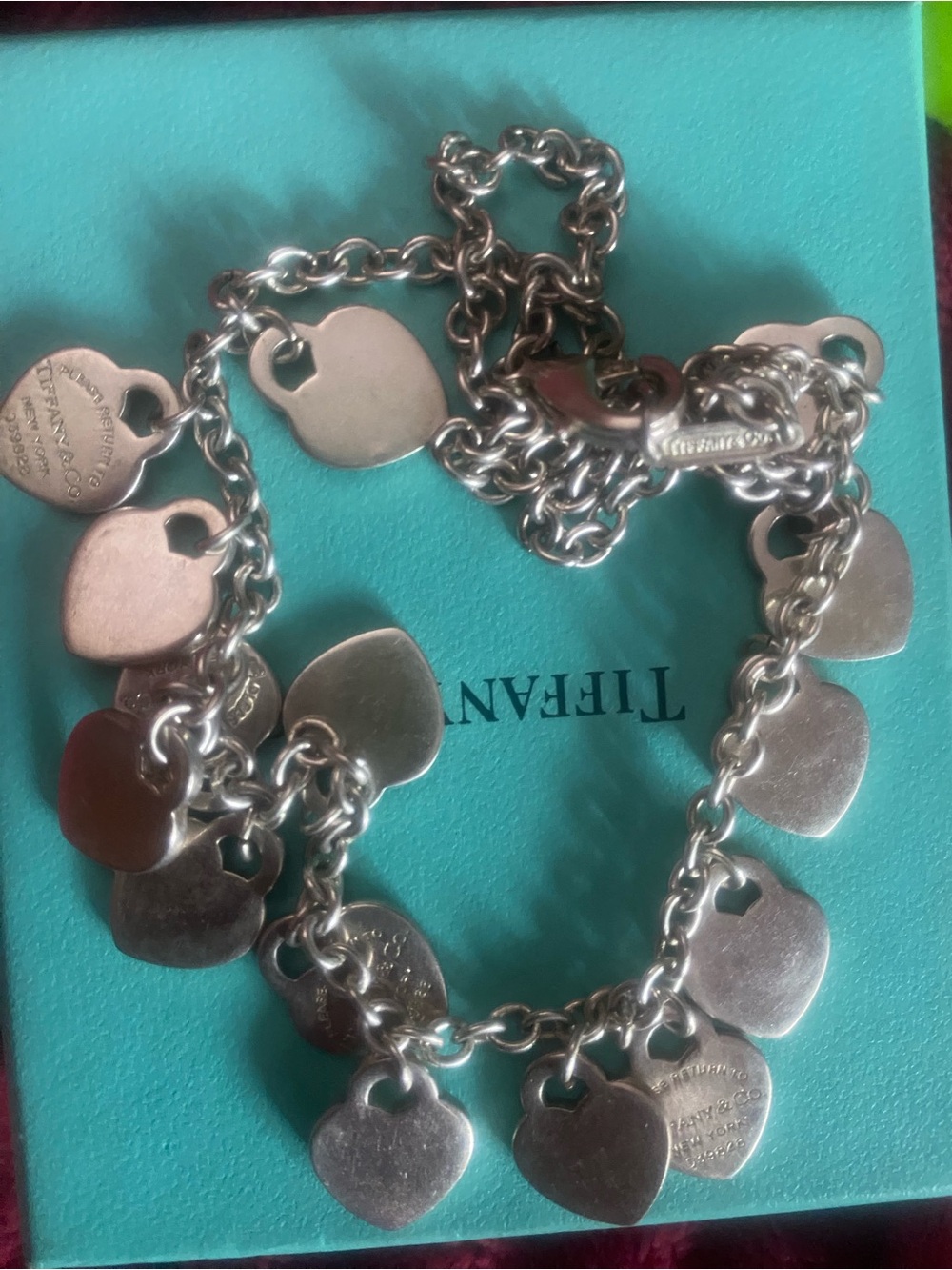 Tiffany & Co. Silver Heart necklace Bracelet on Tiffany Blue